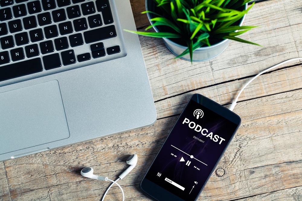Smart phone with 'Podcast' displayed on its screen