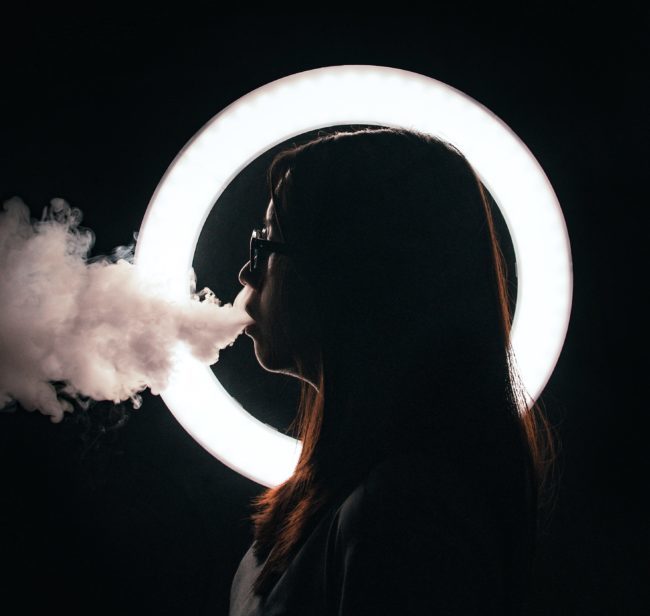 Shadow of a teen vaping