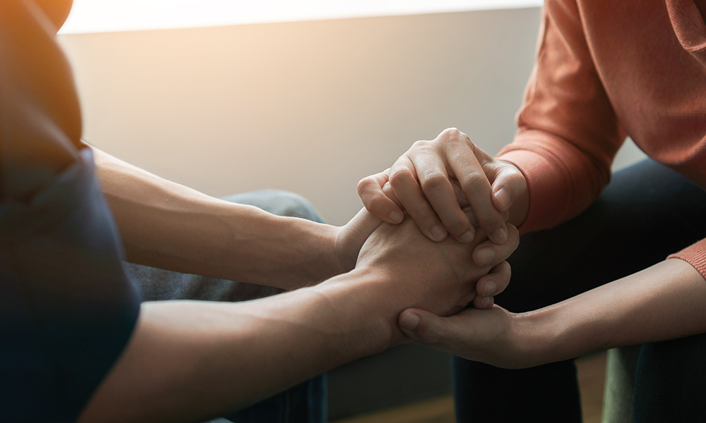 Hands holding