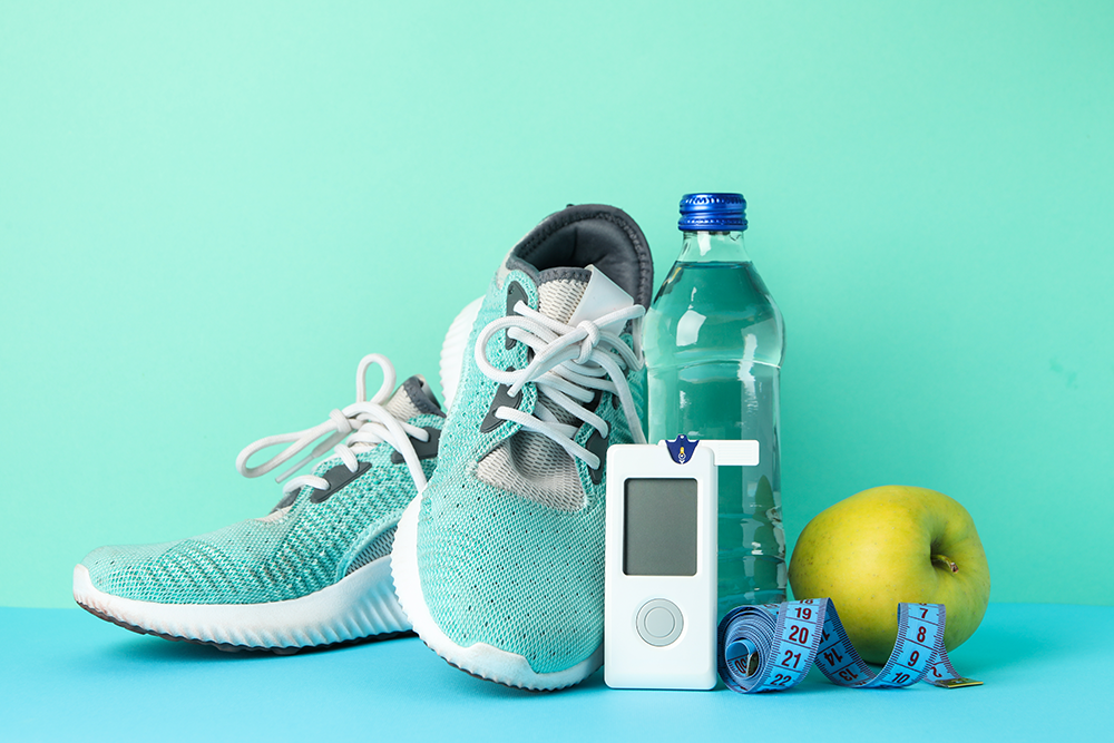 Exercise and healthy eating items with glucose monitor